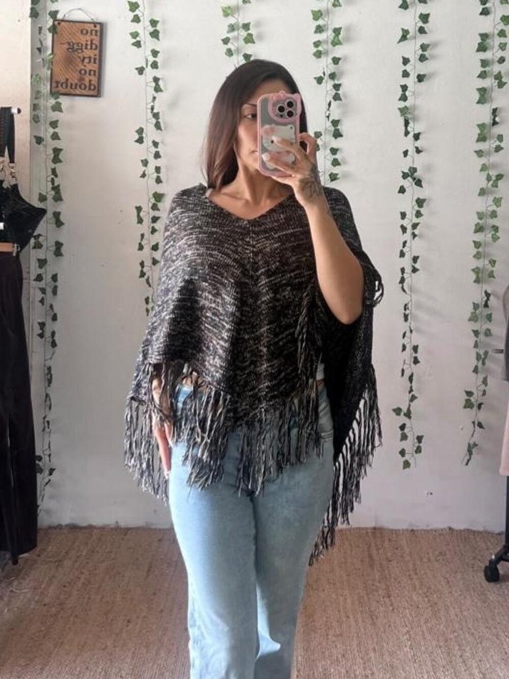 Willow & Clay black and beige fringe poncho sweater with a boho vibe